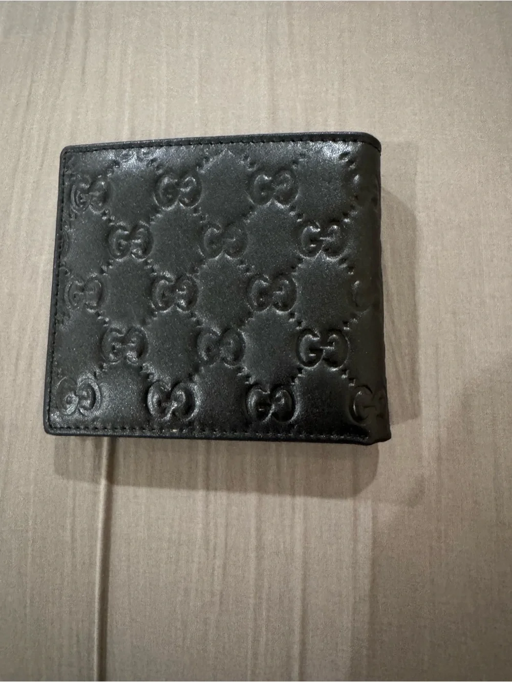 Gucci Black Embossed GG Leather Wallet